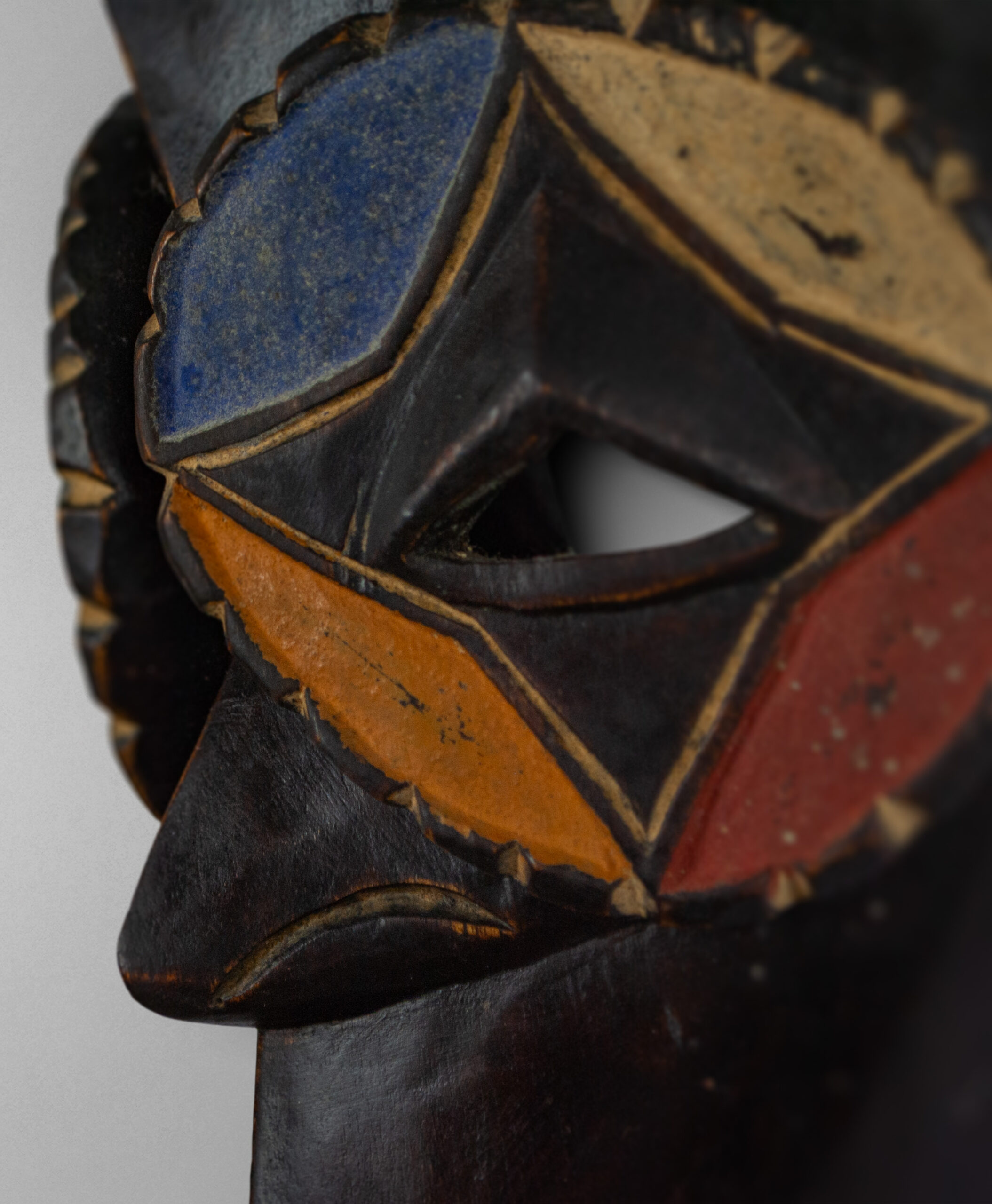 detail view of eket tribal mask from nigeria