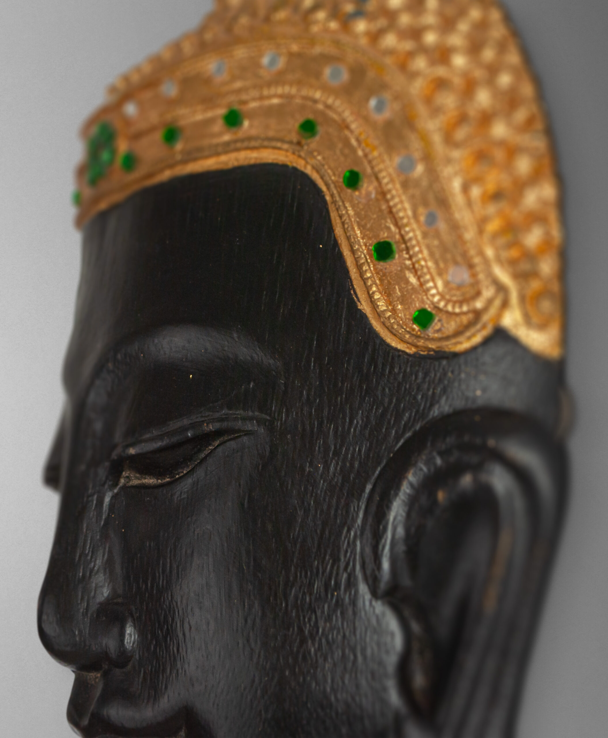 detail view of buddha mask from thailand