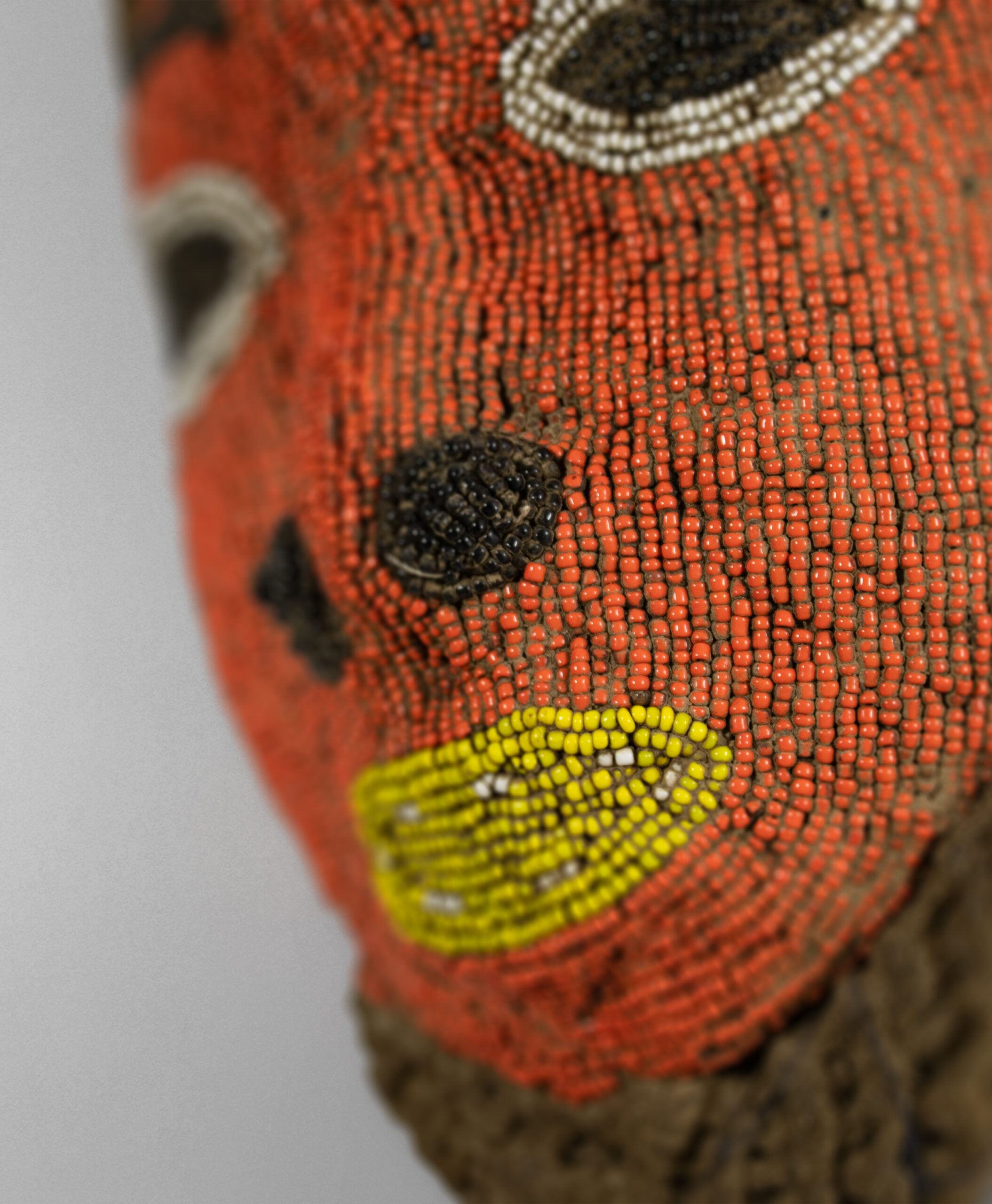 detail view of bamileke tribal mask from cameroon