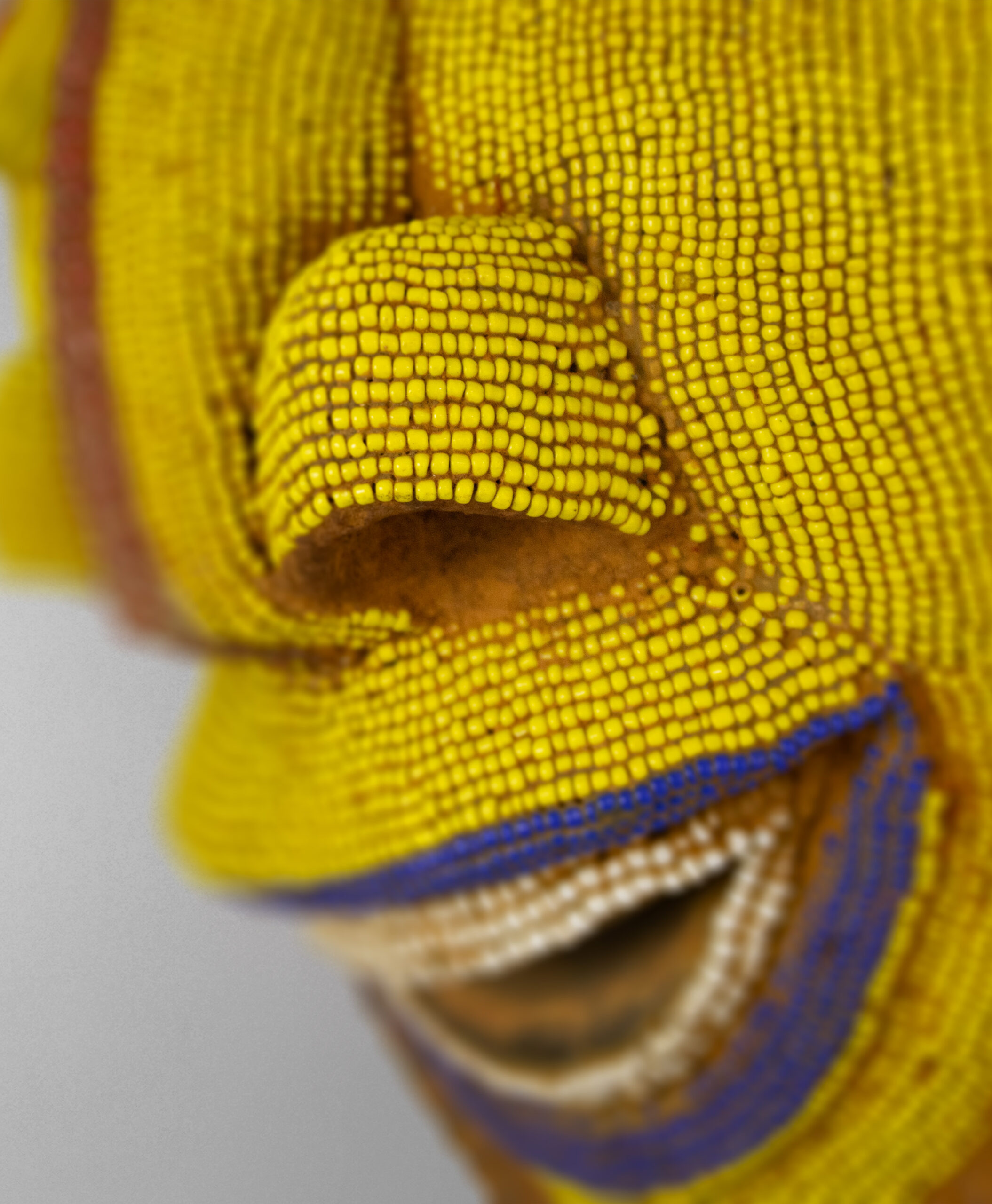 detail view of bamileke mask from cameroon