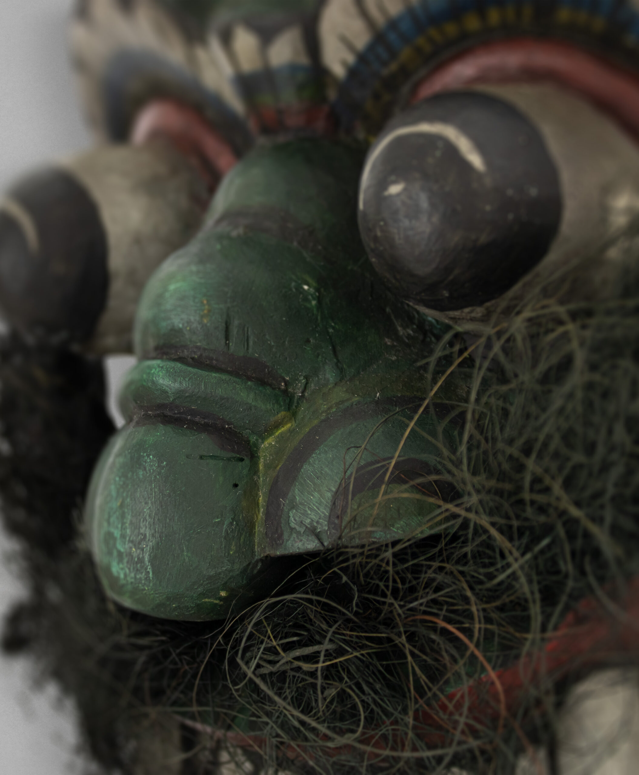 detail view of naga raksha mask from sri lanka